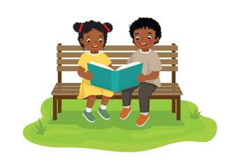 Wall Mural - Cute little African kids reading books together sitting on bench in the park
