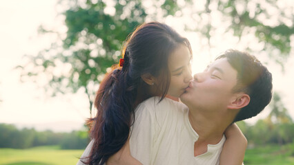 young adult asia people fiance happy lover flirt fall in love nose kiss hug cuddle care trust. sweet