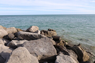 rocks in the sea wavebreaker huge big rock in salt water