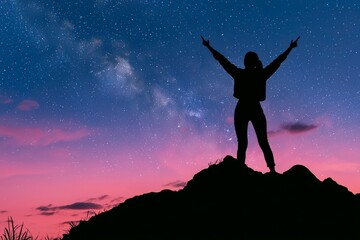 a joyful woman stands on the mountain beneath a starry night sky with the milky way, symbolizing fre