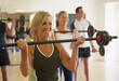 © fStop - People at a body pump fitness class