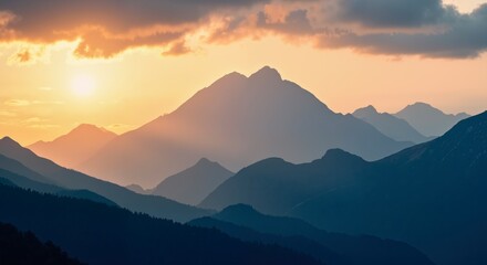 Wall Mural - The mountains are covered in a blue sky with a sun setting in the background