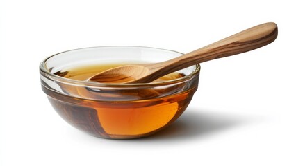 Wall Mural - bowl of honey with wooden spoon placed beside it