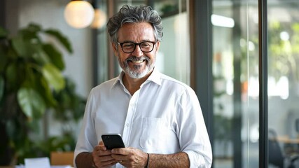 Wall Mural - The Smiling Businessman with Smartphone