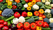 © Gerald - A bright and colorful display of various fresh vegetables, including bell peppers, cauliflower, broccoli, and more, arranged neatly in a grocery store setting.