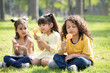 © Royaltyfreecliick - Children Eating Lollipop Spiral