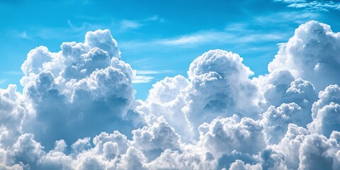 Poster - Majestic clouds drift across a vibrant blue sky, showcasing the beauty of clouds in various formations. The stunning clouds contrast beautifully with the clear blue sky.
