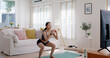 © ChayTee - Young adult asia people girl fun squat weight loss on TV online gym class at home. Active self love good shape woman enjoy diet course wear smart watch health IOT fitness tracker internet of things.