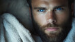 © Екатерина Чумаченко - A close up of a man with a beard and blue eyes