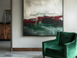 © Saqib - Contemporary living room with abstract art, emerald green armchair, and modern decor for a sophisticated look.
