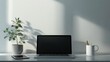 © Julia - Workspace laptop computer, tablet, pencil and coffee cup with plant pot on modern office table.