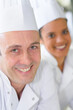© auremar - head and shoulders portrait of male and female chefs