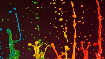 Poster - Acrylic colors splashing on black background. Abstract colored spectrum background.