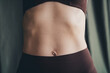 © deagreez - Confident mature woman embracing natural beauty and body positivity in studio