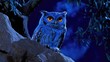 © DZIKRA  - A blue owl perched on a branch at night, with striking orange eyes against a dark backdrop.