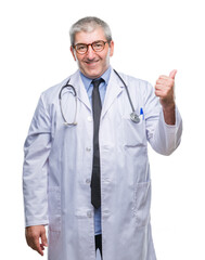 Handsome senior doctor man over isolated background smiling with happy face looking and pointing to the side with thumb up.