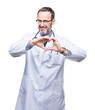 © Krakenimages.com - Middle age senior hoary doctor man wearing medical uniform isolated background smiling in love showing heart symbol and shape with hands. Romantic concept.