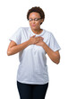 © Krakenimages.com - Beautiful young african american woman wearing glasses over isolated background smiling with hands on chest with closed eyes and grateful gesture on face. Health concept.