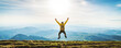 © Davide Angelini - Happy hiker jumping on the top of the mountain at sunset - Man with backpack and arms up standing on the cliff - Happiness and travel concept