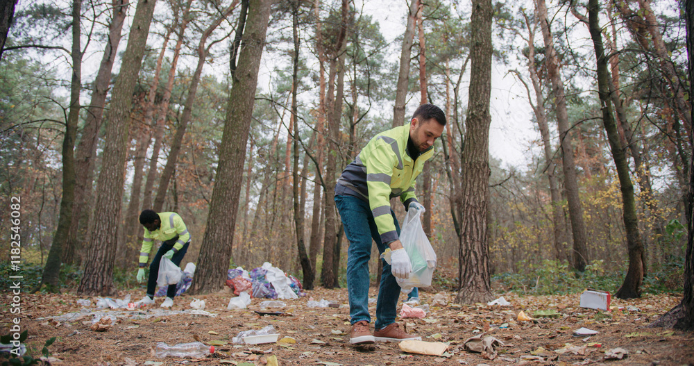 Camera showing modern problems of plastic pollution. People actively ...