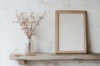 © Saloha - Elegant display of spring blooms and a blank frame on a rustic wooden shelf evoking tranquility and minimalism in a cozy interior atmosphere