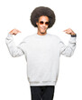 © Krakenimages.com - Young african american man with afro hair wearing sunglasses looking confident with smile on face, pointing oneself with fingers proud and happy.