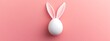 © AnnaN - white mockup egg with bunny rabbit ears isolated on pink background, Easter spring holiday concept, minimalist style, top view, flat lay, copy space, blank template egg for design