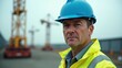 © ANDREY PROFOTO - Middleaged construction worker in safety gear at construction site
