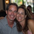 © StockUp - A joyful couple sharing smiles and happiness while posing for a selfie in a lively atmosphere.