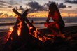 © Leonardo Borges/Stocksy - Man on a beach next to a campfire at sunset
