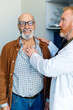 © DZ FILM/Stocksy - The doctor listens to the patient using a stethoscope