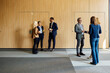 © Boris Jovanovic/Stocksy - Colleagues talk during a seminar break