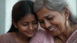 © AMA STUDIO - Indian grandmother and granddaughter sharing a tender moment of affection