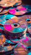 © Siasart - Stack of CDs Reflecting Vivid Pink and Blue Light Creates Colorful Abstract Pattern
