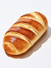 Wall Mural - a photostock of a freshly baked loaf of artisan bread with a golden crust, set on a clean white surf