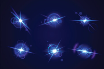 Wall Mural - glint and glare optical effects collection - bright blue luminous starbursts with radiant beams on d