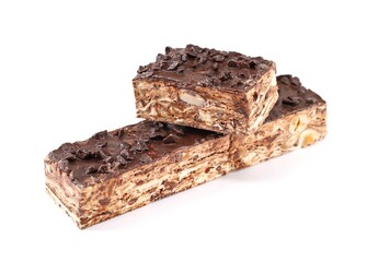 Torrone with chocolate on white background. A whole nougat with a piece on it.