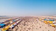 © Ryzhkov - Aerial View of Mahakumbh Mela Thousands of Pilgrims, Colorful Tents, and Sacred Rituals by the Ganges River © Ryzhkov - Aerial View of Mahakumbh Mela Thousands of Pilgrims, Colorful Tents, and Sacred Rituals by the Ganges River