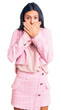 © Krakenimages.com - Young beautiful latin girl wearing business clothes shocked covering mouth with hands for mistake. secret concept.