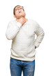 © Krakenimages.com - Middle age arab man wearing glasses over isolated background Touching painful neck, sore throat for flu, clod and infection
