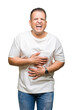 © Krakenimages.com - Middle age arab man wearig white t-shirt over isolated background Smiling and laughing hard out loud because funny crazy joke. Happy expression.