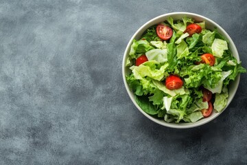 Wall Mural - Healthy vegetable coleslaw in a bowl suitable for keto or paleo diets against a grey backdrop