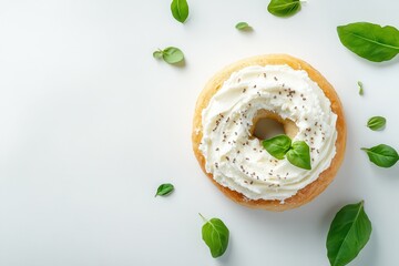 Sticker - Tasty fresh bagel with cream cheese on a white backdrop overhead shot