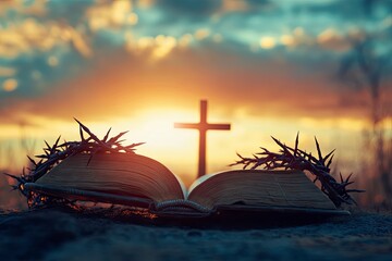 Wall Mural - Christian Cross and open book with a crown of thorns with a sunset scene background. Palm Sunday Concept 