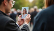 © Ektala - Grief support group Man holding photo of deceased woman at funeral