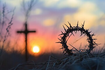 Wall Mural - Crown of thorns of Jesus Christ against silhouette of catholic cross at sunset background 