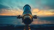© rashyn - Brass telescope overlooking a vibrant sunset over ocean.
