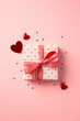 © photoguns - Valentine's Day gift box with hearts on pastel pink background. Shopping, sale, promotion concept.