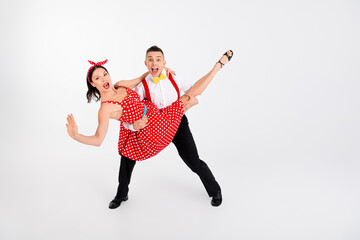 Full length photo of two young people dancing performance have good mood isolated on white color background