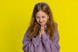 © Andrii Iemelianenko - Sneaky cunning preteen child girl kid with tricky face gesticulating and scheming evil plan, thinking over devious villain idea, cheats, jokes, pranks. Teenager children isolated on yellow background